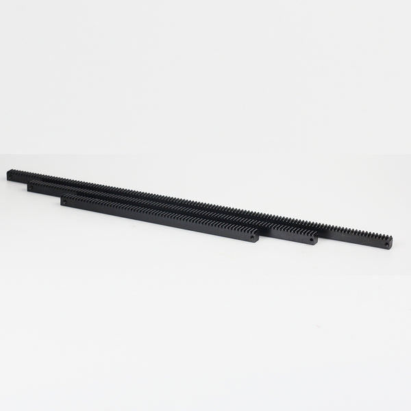 Carbon steel rail for stop motion winder